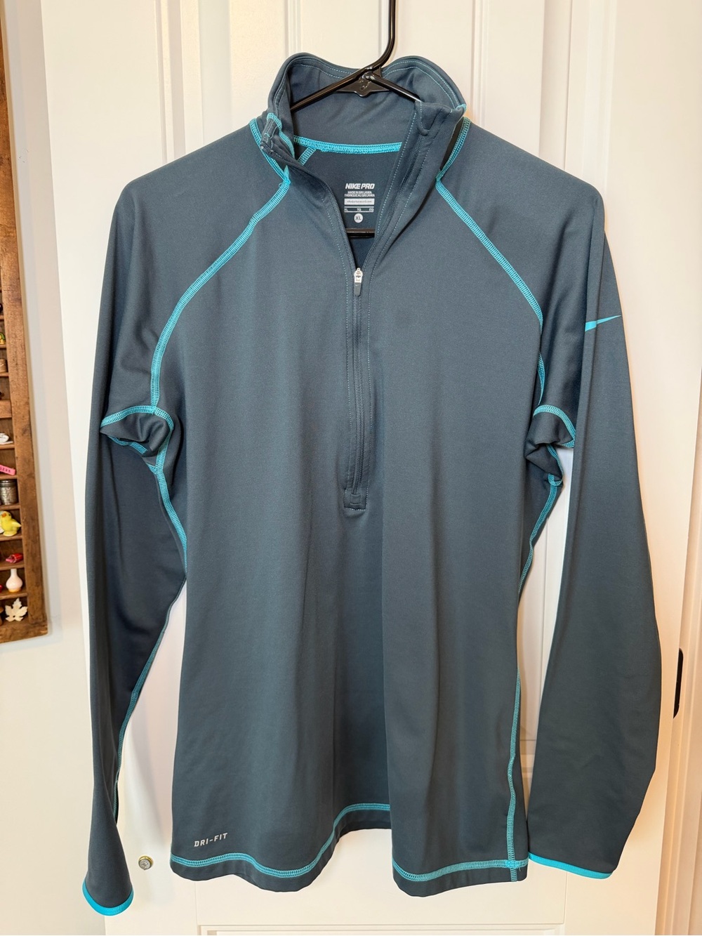 Nike Dri-FIT Women’s Long-Sleeve Half-Zip in Dark Gray with Teal Trim